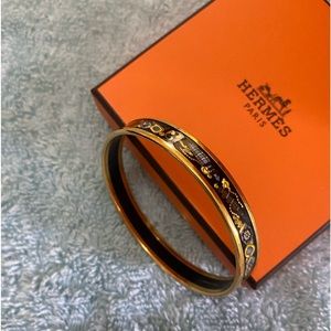 Hermes Perfume Bottle design bangle in gold.